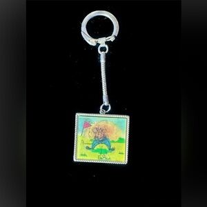 Vintage Vari-Vue Golfer swinging club keychain motion lenticular animation 1960